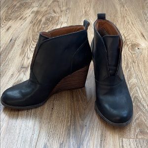Black wedge booties